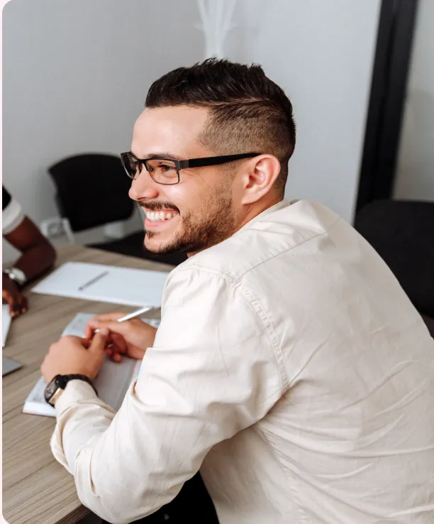 Employee smiling while reviewing private results